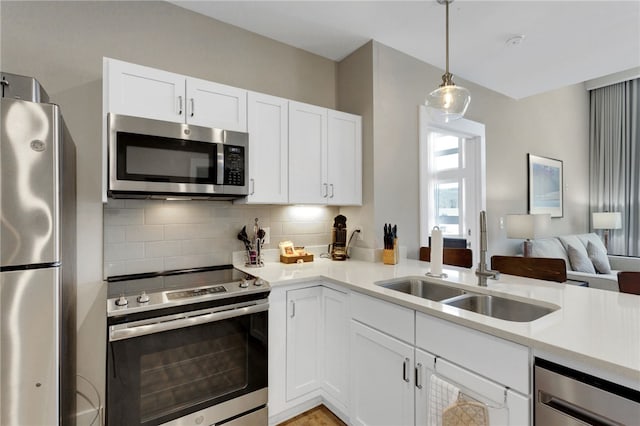 13500 Clemson Blvd Unit 1201Ab, Seneca, SC 29678 - kitchen with appliances with stainless steel finishes, light countertops, decorative backsplash, and open floor plan