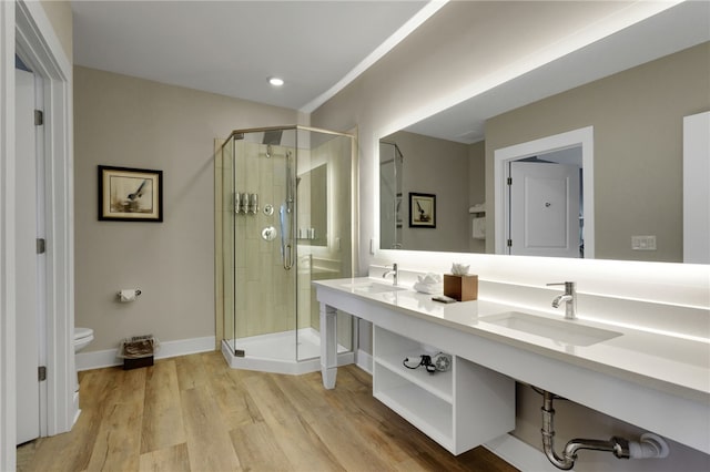 13500 Clemson Blvd Unit 1201Ab, Seneca, SC 29678 - bathroom with a shower stall, double vanity, wood finished floors, and recessed lighting
