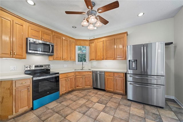 168 Wilderness Pt, Hartwell, GA 30643 - kitchen with stainless steel appliances, stone finish flooring, a ceiling fan, light countertops, and recessed lighting