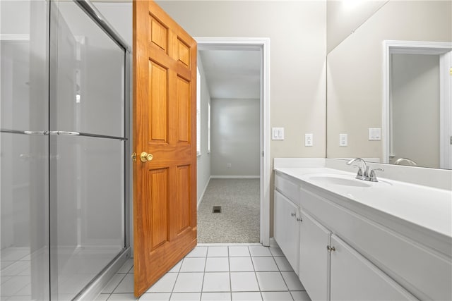 168 Wilderness Pt, Hartwell, GA 30643 - bathroom featuring vanity, a stall shower, and tile patterned flooring