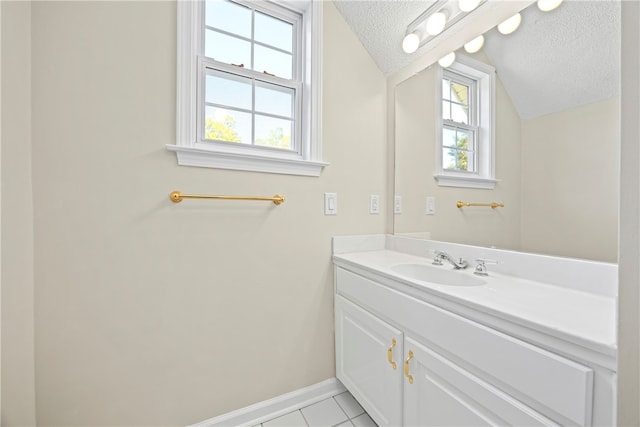 168 Wilderness Pt, Hartwell, GA 30643 - bathroom with a textured ceiling, vanity, vaulted ceiling, and tile patterned floors