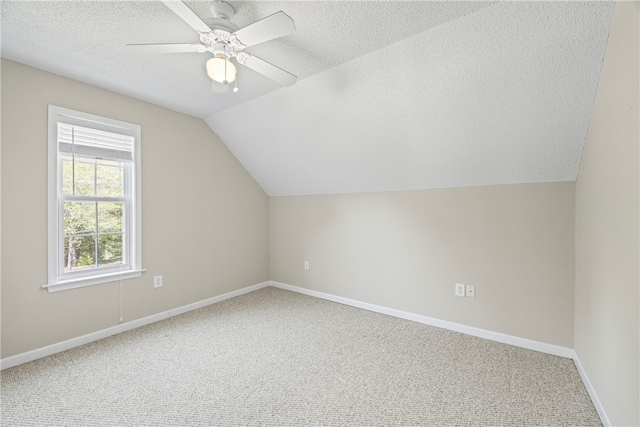 168 Wilderness Pt, Hartwell, GA 30643 - additional living space with a textured ceiling, carpet flooring, vaulted ceiling, and ceiling fan