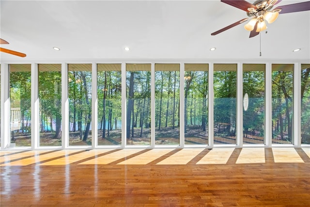 168 Wilderness Pt, Hartwell, GA 30643 - spare room featuring ceiling fan, plenty of natural light, recessed lighting, wood finished floors, and expansive windows