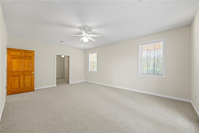 168 Wilderness Pt, Hartwell, GA 30643 - unfurnished bedroom with carpet floors, a textured ceiling, and a ceiling fan