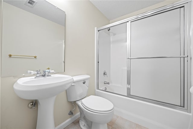 168 Wilderness Pt, Hartwell, GA 30643 - full bath with enclosed tub / shower combo, tile patterned floors, and a textured ceiling