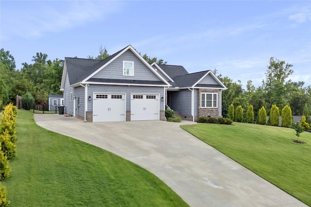 340 Fiddlers Way, Seneca, SC 29678 - craftsman-style house featuring a front yard, concrete driveway, a garage, and stone siding