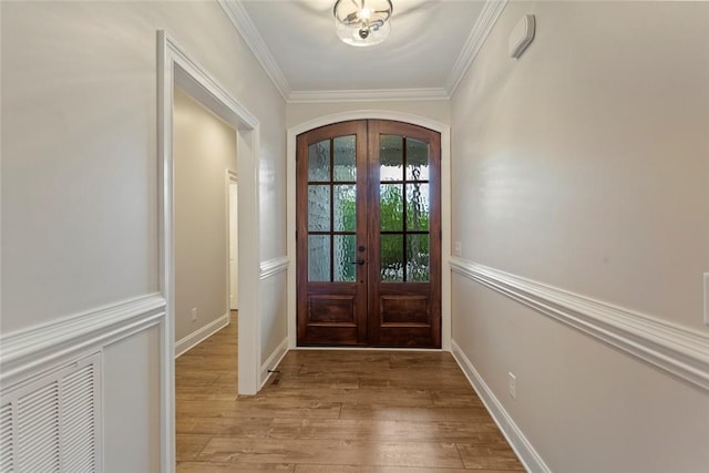 340 Fiddlers Way, Seneca, SC 29678 - doorway featuring french doors, light wood-style floors, crown molding, and arched walkways