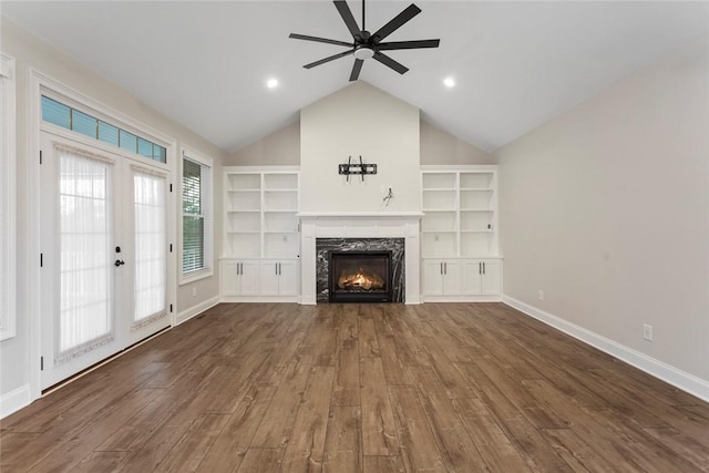 340 Fiddlers Way, Seneca, SC 29678 - unfurnished living room with wood finished floors, ceiling fan, a premium fireplace, vaulted ceiling, and built in features