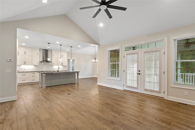 340 Fiddlers Way, Seneca, SC 29678 - living room with a ceiling fan, wood finished floors, high vaulted ceiling, french doors, and recessed lighting