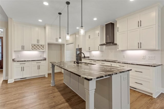 340 Fiddlers Way, Seneca, SC 29678 - kitchen featuring wall chimney exhaust hood, decorative backsplash, light wood-style flooring, recessed lighting, and oven