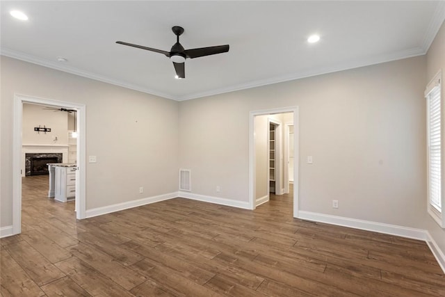 340 Fiddlers Way, Seneca, SC 29678 - spare room featuring a ceiling fan, crown molding, dark wood finished floors, a high end fireplace, and recessed lighting