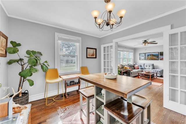 423 Lebanon Rd, Pendleton, SC 29670 - dining room with wood finished floors, crown molding, a chandelier, and ceiling fan