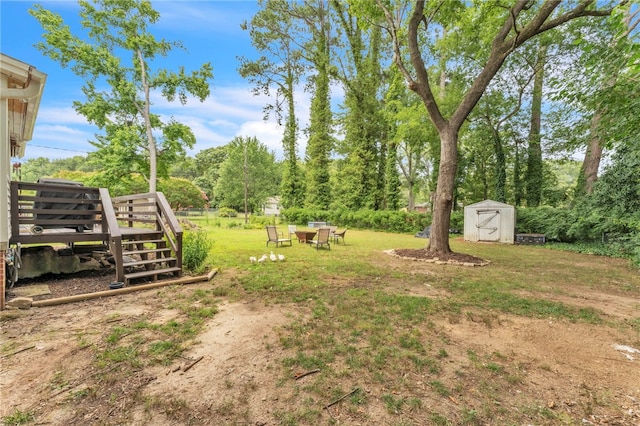 423 Lebanon Rd, Pendleton, SC 29670 - view of green lawn featuring a shed and a deck