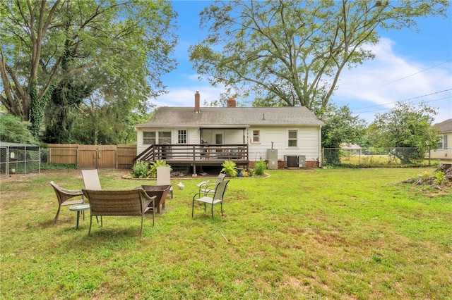 423 Lebanon Rd, Pendleton, SC 29670 - rear view of property featuring a fenced backyard, a wooden deck, a chimney, and a gate