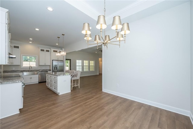 218 W Halfway Branch Rd, Walhalla, SC 29691 - kitchen with appliances with stainless steel finishes, a chandelier, a kitchen bar, open floor plan, and a kitchen island