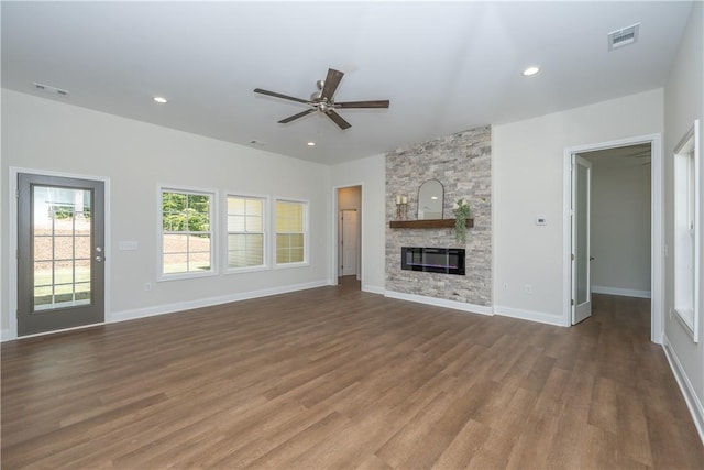 218 W Halfway Branch Rd, Walhalla, SC 29691 - unfurnished living room with a ceiling fan, wood finished floors, a stone fireplace, and recessed lighting
