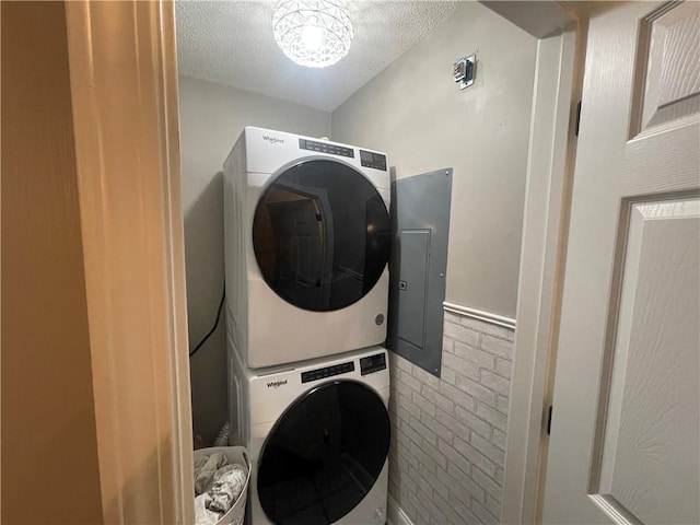 726 Lookover Dr Unit 726, Anderson, SC 29621 - washroom with estacked washer and dryer, electric panel, and a textured ceiling