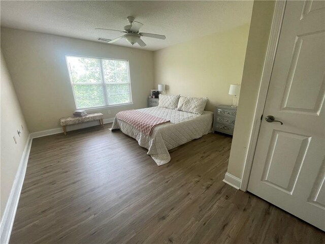 726 Lookover Dr Unit 726, Anderson, SC 29621 - bedroom with wood finished floors, ceiling fan, and a textured ceiling