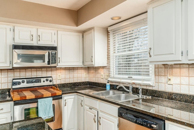 kitchen featuring white cabinets, sink, and stainless steel appliances