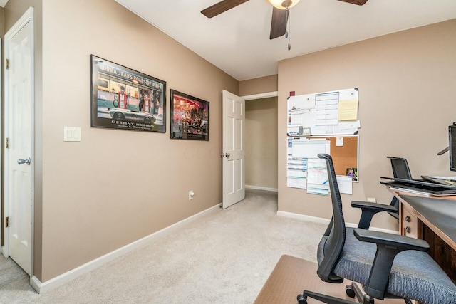 carpeted office with ceiling fan