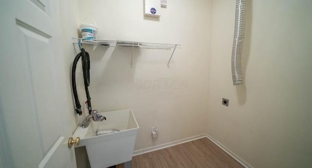 5901 Hickory Brook Way, Columbus, OH 43213 - washroom with electric dryer hookup and wood finished floors