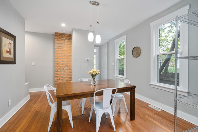 119 Redbud Aly, Columbus, OH 43206 - dining room with light wood-type flooring and recessed lighting
