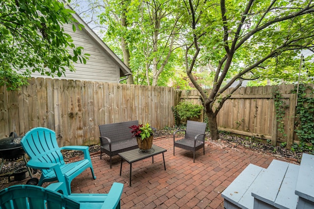 119 Redbud Aly, Columbus, OH 43206 - fenced backyard featuring a patio