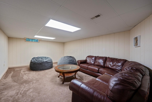12627 Oakmere Dr, Pickerington, OH 43147 - carpeted living area featuring a drop ceiling and wood walls