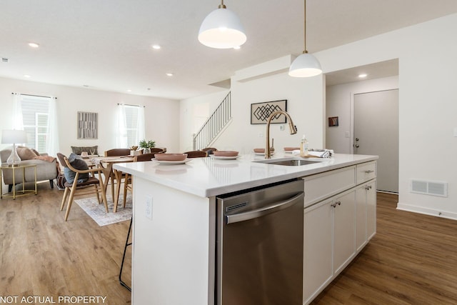 344 Postle Blvd, Columbus, OH 43228 - kitchen with open floor plan, light wood-style flooring, visible vents, dishwasher, and a sink