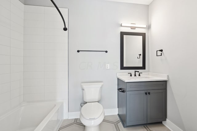 full bathroom featuring tile patterned floors, vanity, toilet, and tiled shower / bath