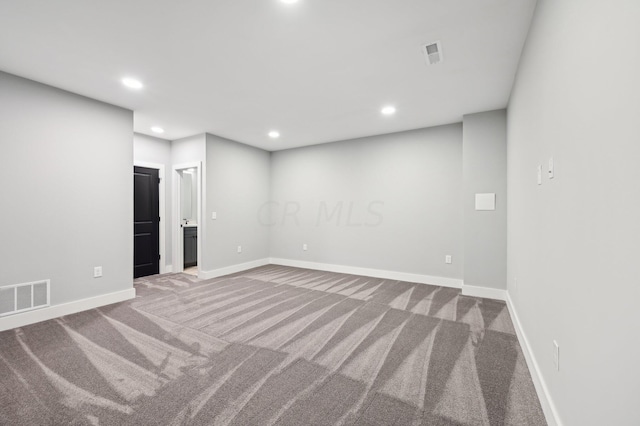 unfurnished room with carpet floors