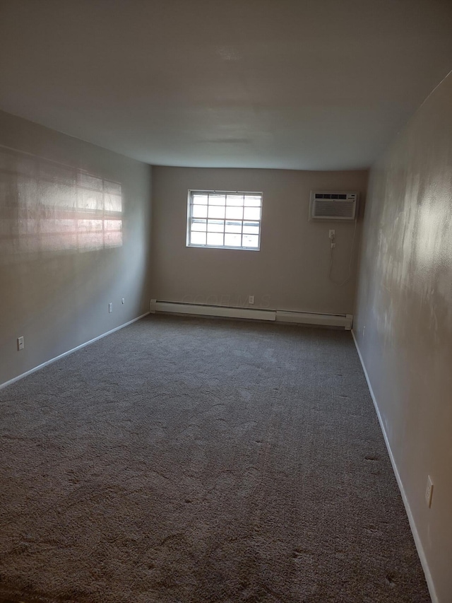 4714 Tarryton Ct S Unit 20-1G, Columbus, OH 43228 - carpeted empty room with a baseboard heating unit and a wall mounted air conditioner