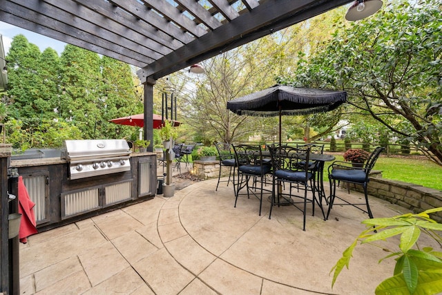 view of patio featuring an outdoor kitchen, a grill, fence, a pergola, and outdoor dining area