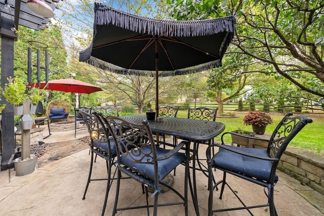 view of patio / terrace with fence and outdoor dining area