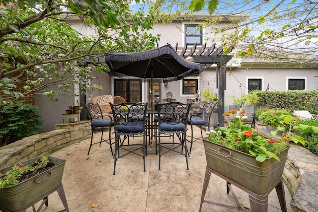 view of patio featuring outdoor dining space