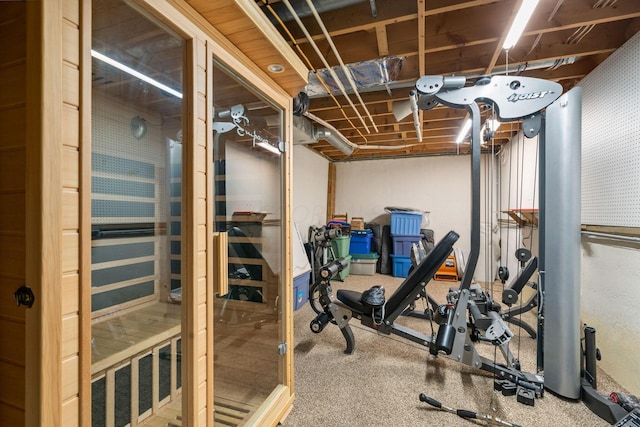exercise room with a sauna