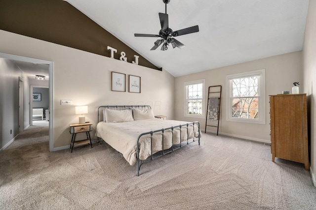 bedroom with lofted ceiling, baseboards, carpet, and ceiling fan