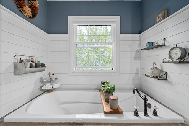 full bathroom with a garden tub