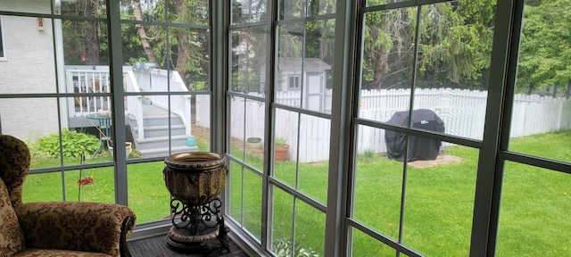 unfurnished sunroom with a healthy amount of sunlight