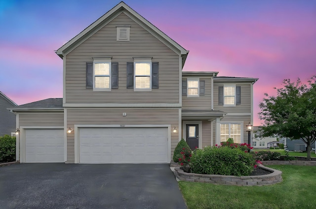 5421 Mercier St, Lewis Center, OH 43035 - traditional-style house with asphalt driveway and a garage