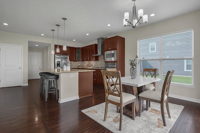 5421 Mercier St, Lewis Center, OH 43035 - dining space featuring dark wood finished floors, baseboards, a chandelier, and recessed lighting