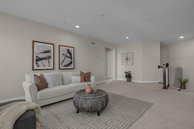 5421 Mercier St, Lewis Center, OH 43035 - living area featuring carpet floors, baseboards, recessed lighting, and a textured ceiling