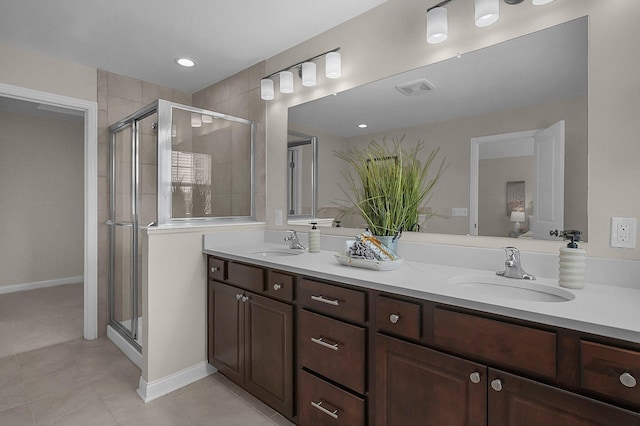 5421 Mercier St, Lewis Center, OH 43035 - bathroom featuring double vanity, a stall shower, and tile patterned floors