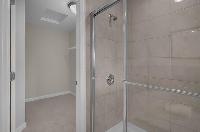 5421 Mercier St, Lewis Center, OH 43035 - full bathroom featuring a shower stall, a spacious closet, and baseboards