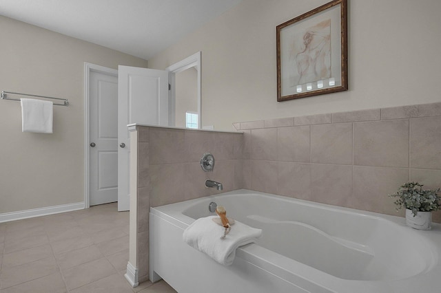 5421 Mercier St, Lewis Center, OH 43035 - bathroom featuring a garden tub, tile patterned flooring, and baseboards
