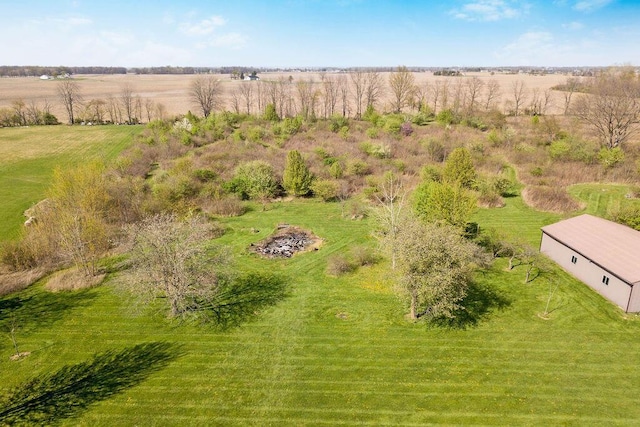 birds eye view of property featuring a rural view