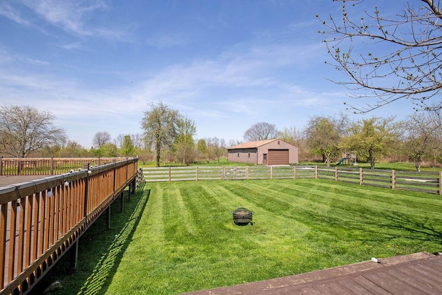 view of yard with a rural view