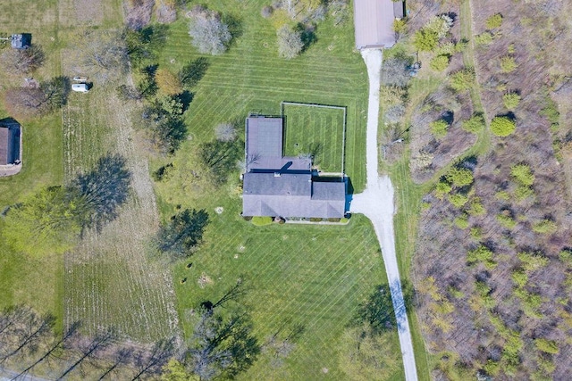 birds eye view of property with a rural view