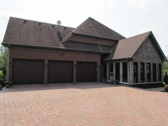 view of side of property featuring a garage