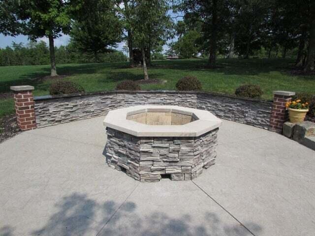 view of patio / terrace featuring an outdoor fire pit